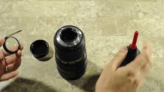 How to remove dust from Nikon 2470mm lens [upl. by Yrian445]