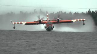 CL415 Canadair or Bombardier Water Bomber pick up and water drop [upl. by Ayotna]