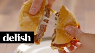 How To Make Pizza Burgers  Delish [upl. by Ydnal]