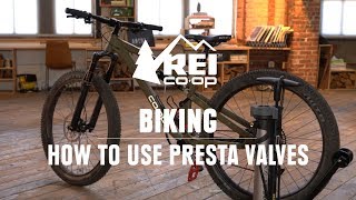 How to Pump Up a Bike Tire With Presta Valves  REI [upl. by Elbam]