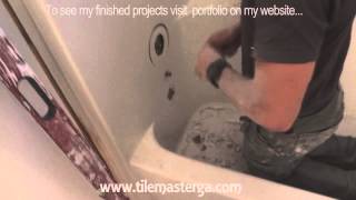 How to remove tub fiberglass shower enclosure demo tearout Small bathroom remodel [upl. by Sweet985]