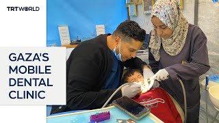 Mobile dental clinic offering care to displaced Palestinians [upl. by Ahsiugal]