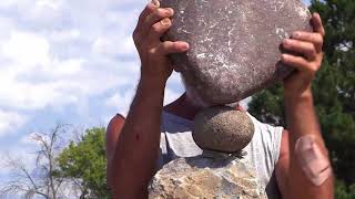 The man who balances rocks at Remic Rapids [upl. by Sayed]