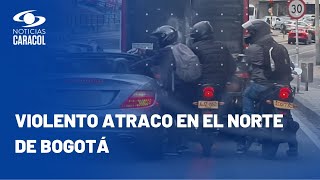 Sujetos en moto amenazaron y atracaron a conductor de Mercedes Benz en Bogotá [upl. by Rozanne]