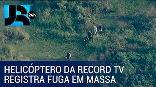 Helicóptero da Record TV registra fuga em massa de traficantes [upl. by Hernandez]