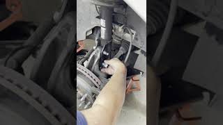 Chevy Traverse strut replacefixrepairstruts repairingdiy savemoney automobile homemechanic [upl. by Hirasuna101]