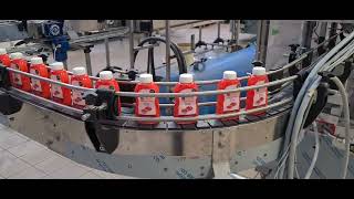 SCALIGERA PACKAGING Sleeve Applicator for PET Bottle 6000 bph [upl. by Ryley]