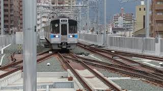 quot新quot松山駅 宇和島方の片渡線を渡る7000系とキハ54同時入線 [upl. by Kenelm]