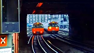 🚇 1973 TUBE STOCK CROSSING at BARONS COURT London Undergorund [upl. by Lirba]