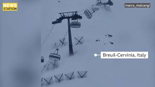 Strong winds jolt Italy ski lift with passengers on board [upl. by Ozkum]