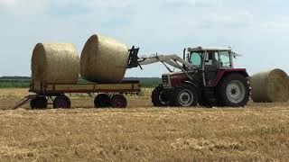 RONDE STROBALEN LADEN MET VOORLADER STEYR 8090 [upl. by Judah]