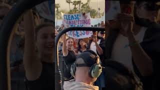 Emma Chamberlain holding a quotPlease play Espressoquot sign during Sabrina Carpenters Coachella set W2 [upl. by Aneehsar770]