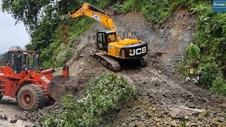 Excavator and Wheel Loader Clearing Ramp and Road Together [upl. by Dranyer607]