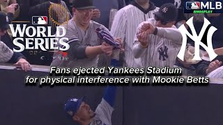 Fans ejected Yankees Stadium for physical interference with Mookie Betts MLB World Series 2014 [upl. by Anauqaj]