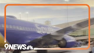 Cellphone battery catches fire on Southwest flight at DIA prompts evacuation [upl. by Hegarty196]