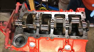 Engine Building 101 How To Install A Crankshaft [upl. by Oinota839]