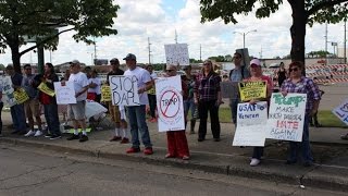 Protesters Line Up Outside Donald Trump Rally in Bismarck [upl. by Polivy373]