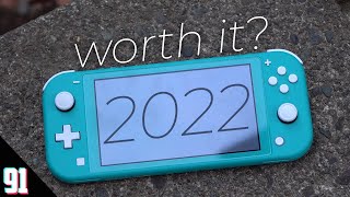 Nintendo Switch Lite in 2022  worth it Review [upl. by Yrelle]