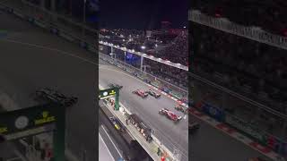 LIGHTS OUT IN VEGASRussell gets to Turn 1 first with both Ferraris tucking F1 LasVegasGP [upl. by Accire]