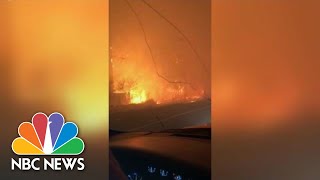 Watch A Father Calm His Daughter As They Drive Out Of Wildfire Range  NBC News [upl. by Punke]