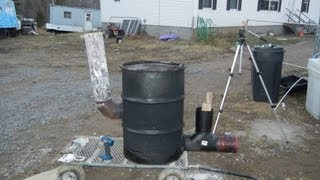 Building 6quot stove pipe rocket stove heater 55 gallon drum version part 2 [upl. by Nwahsaj150]