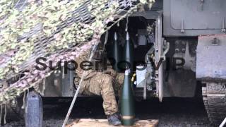 Royal Artillery gunners fire their 105mm light guns durin [upl. by Htebazle]