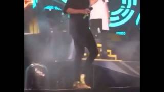 Harry Styles Trips and Falls on Stage During One Direction Concert [upl. by Donall]