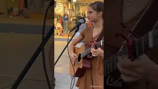 Karolina Protsenko talks to the crowd and plays guitar [upl. by Wonacott622]