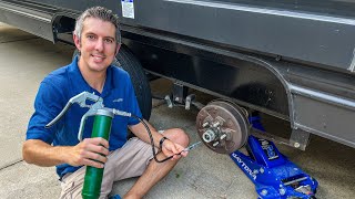 How to grease trailer wheel bearings [upl. by Briggs861]