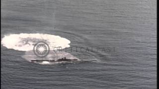 A partially sunken Japanese submarine explodes after being hit by a torpedo inHD Stock Footage [upl. by Lehacim]