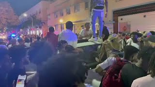 VIDEO Massive spring break crowds fights in Miami [upl. by Clara]