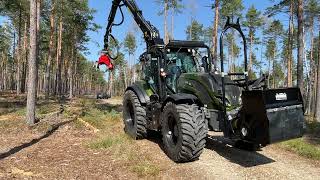 Valtra tractor equipped with Nisula 500H harvester head [upl. by Popelka]