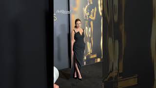 ElizabethOlsen Poses for Cameras at the Oscars GovernorsAwards Carpet shorts [upl. by Brenn239]