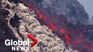 Lava flows following eruption at Italys Mount Etna volcano [upl. by Joselow]