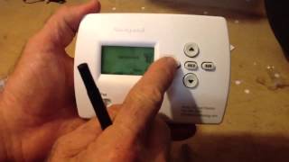 How to program a Honeywell Pro 4000 thermostat [upl. by Eiba155]