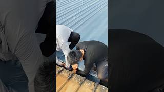 Laying process of steel roof waterproofing membrane with adhesive craftsman shorts [upl. by Nayarb]