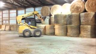 Stacking Round Bales [upl. by Nema]