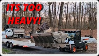 Using Our Bobcat Toolcat 5600 To Unload Two Salt Spreaders [upl. by Oninrutas]