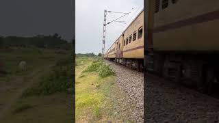 Gangasagar express passing through a serene village train highspeedjourney railway icf [upl. by Ddej]