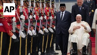 Pope Francis arrives in Indonesia to start the longest trip of his pontificate [upl. by Sheaff]