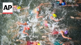 Triathlon kicks off on Day 5 at Paris Olympics  AP Top Photos [upl. by Kerrison]