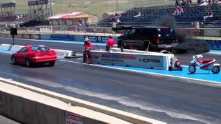 Ford Excursion 73 Powerstroke Diesel Vs Mustang GT [upl. by Anialed]