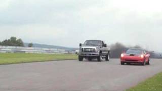 Tuned 64 Powerstroke vs vette Flashlight Drags at Beaverun 6102010 [upl. by Olcott]