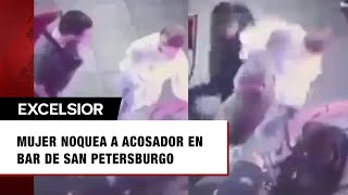 ¡De dos golpes Mujer noquea a acosador en bar de San Petersburgo [upl. by Aneema]