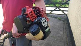 How to Install Strimmer Wire  Dolmar [upl. by Sllew]