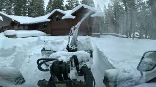 Bobcat Toolcat 5600 blowing 3 FEET of snow off a residential driveway near Tahoe CA [upl. by Enihpad]