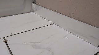 How To Install A Tile Bullnose Baseboard SIMPLE amp EASY [upl. by Assilev570]