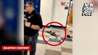 Chilling video shows Georgia school shooters gun on the floor after hallway bloodbath [upl. by Anibor]