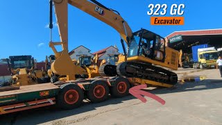 Excavator CAT transporting by truck [upl. by Simonsen]