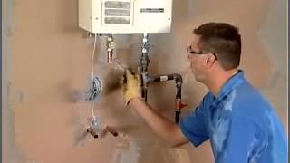 Tankless Water Heater Installation Plumbing and Gas Connections [upl. by Kcirderf]